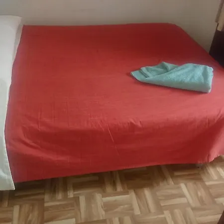 Séjour chez l'habitant Melide Rooms